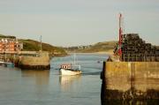 Boat entering Padstow harbour
