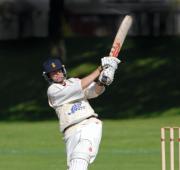 Troon opener and century maker James Bryant hits a four to bring up Troon's 200 runs.