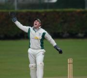 Grampound Rd. wicket keeper Dave Wilton celebrates catching out Malcolm Thomas.